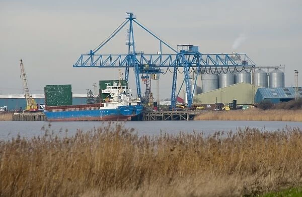 Isartal cargo ship unloading at docks, River Trent, Flixborough, Scunthorpe, North Lincolnshire, England, january