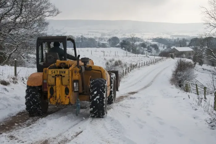 Framed Print : JCB 530 loader clearing snow from road for milk tanker on dairy farm, Whitewell, Lancashire, England, december Framed Print : JCB 530 loader clearing snow from road for milk tanker on dairy farm, Whitewell, Lancashire, England, december