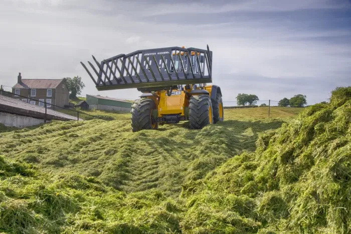 Framed Print : JCB loader compressing grass silage clamp, Grimsargh, Preston, Lancashire, England, July Framed Print : JCB loader compressing grass silage clamp, Grimsargh, Preston, Lancashire, England, July