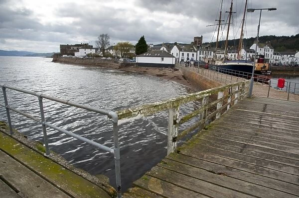 Jetty and town on shore of sea loch, Inverary, Loch Fyne, Argyll and Bute, Scotland, april