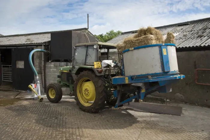 Framed Print : John Deere 2450 tractor with straw bedding machine on dairy farm, Preston, Lancashire, England, July Framed Print : John Deere 2450 tractor with straw bedding machine on dairy farm, Preston, Lancashire, England, July