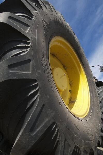 John Deere 4455 tractor, close-up of wheel, Sweden, may