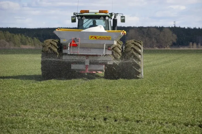 Framed Print : John Deere 8530 tractor with Bredal TX3500 spreader, spreading granular fertilizer on arable field, Tierp Framed Print : John Deere 8530 tractor with Bredal TX3500 spreader, spreading granular fertilizer on arable field, Tierp