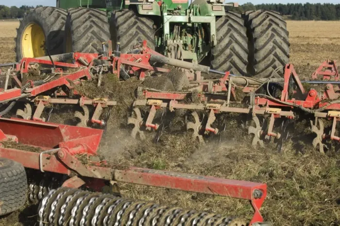Framed Print : John Deere 9400 tractor, harrowing stubble field, Sweden