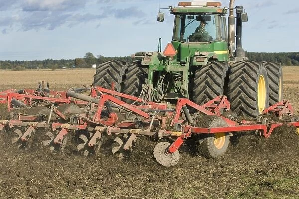 John Deere 9400 tractor, harrowing stubble field, Sweden