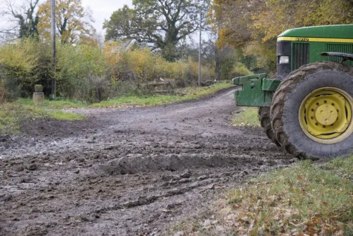 Framed Print : John Deere tractor beside muddy country road, Welshpool, Powys, Wales, November Framed Print : John Deere tractor beside muddy country road, Welshpool, Powys, Wales, November
