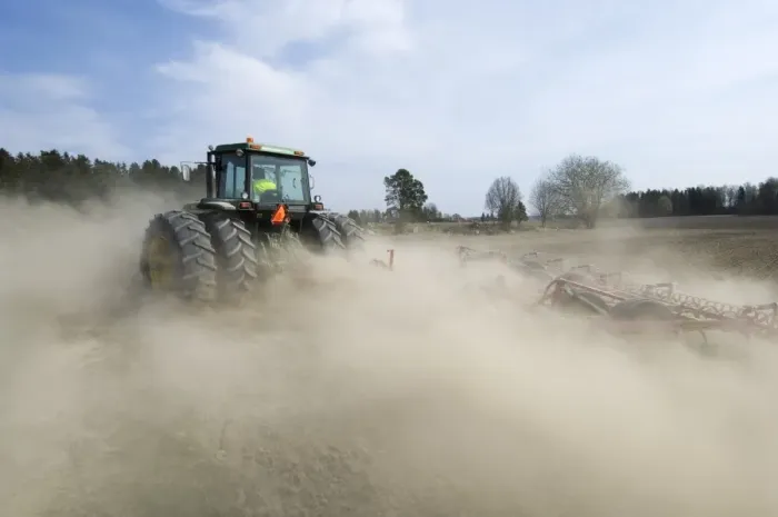 Framed Print : John Deere tractor pulling Vaderstad cultivator, cultivating arable seedbed, in dusty ploughed field, Sweden Framed Print : John Deere tractor pulling Vaderstad cultivator, cultivating arable seedbed, in dusty ploughed field, Sweden
