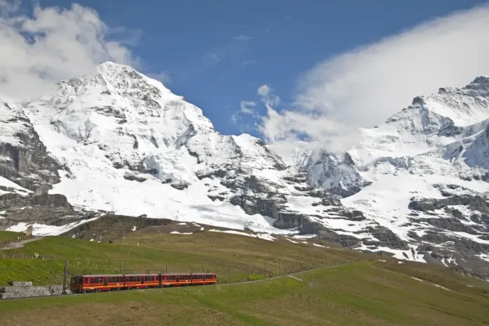 Framed Print : Jungfraubahn train leaving Kleine Scheidegg towards Jungfraujoch, Monch mountain in background, Bernese Alps