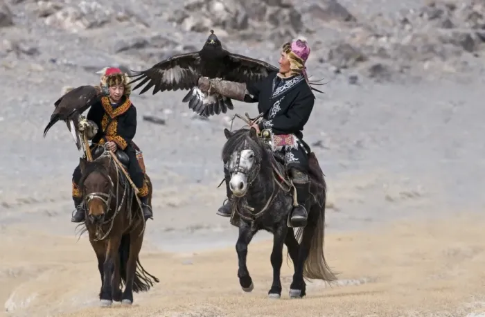 Framed Print : Kazakh hunters on horseback, with hooded Golden Eagles (Aquila chrysaetos), on route to Eagle Hunters Festival Framed Print : Kazakh hunters on horseback, with hooded Golden Eagles (Aquila chrysaetos), on route to Eagle Hunters Festival