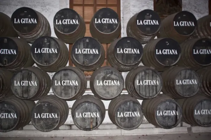 Framed Print : La Gitana sherry at Sanlucar de la Barrameda. Sherry is matured slowing in these barrels before bottling Framed Print : La Gitana sherry at Sanlucar de la Barrameda. Sherry is matured slowing in these barrels before bottling