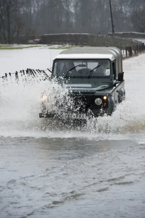 Framed Print : Land Rover driving through flooded road, Cumbria, England, December Framed Print : Land Rover driving through flooded road, Cumbria, England, December