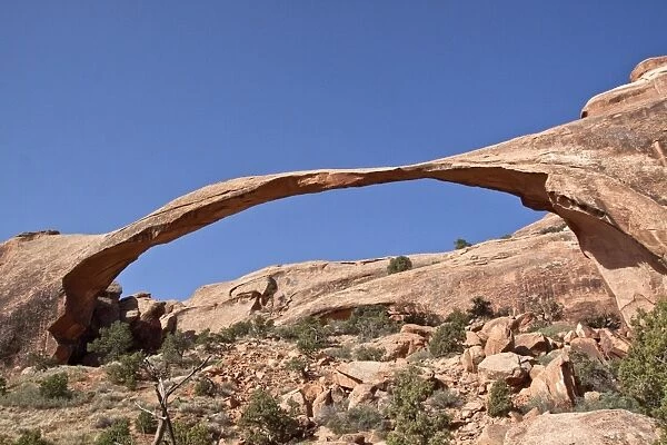 Landscape Arch in Arches National Park, Utah. This arch is made from Entrada Sandstone which over time is eroded by