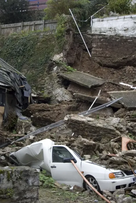 Framed Print : Landslip with van crushed under debris in coastal town, Quay Road, Looe, Cornwall, England, October 2008 Framed Print : Landslip with van crushed under debris in coastal town, Quay Road, Looe, Cornwall, England, October 2008