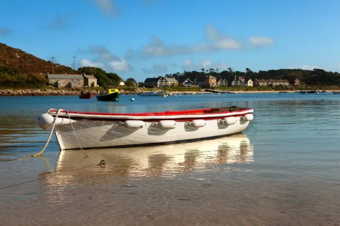 Framed Print : Large rowing boat moored in calm waters of coastal village harbour, New Grimsby, Tresco, Isles of Scilly, England Framed Print : Large rowing boat moored in calm waters of coastal village harbour, New Grimsby, Tresco, Isles of Scilly, England