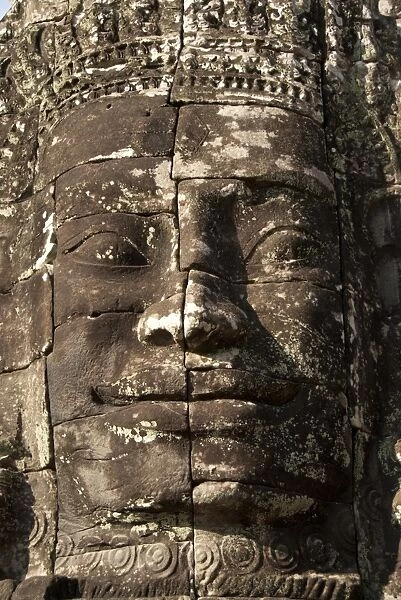 Large sculpture of head in Khmer temple, Bayon, Angkor Thom, Siem Riep, Cambodia