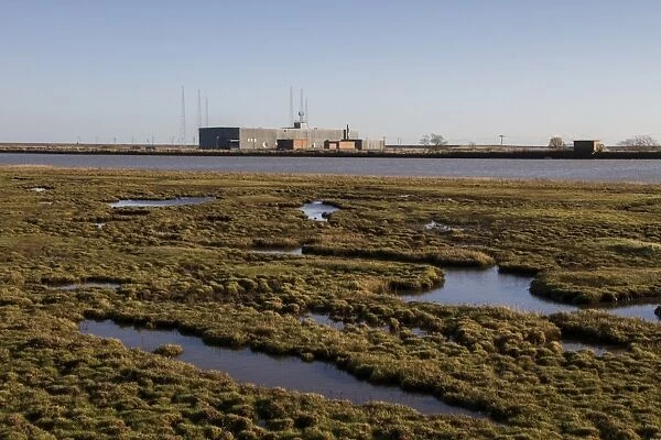 Looking over salt marsh on the edge of the River Alde, east toward the Radio station and masts on Orford Ness, Suffolk