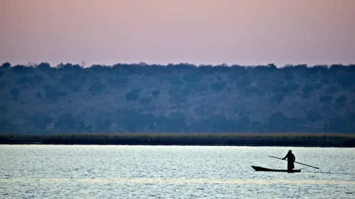 Framed Print : Makoro canoe silhouetted at sunset, Chobe N. P. Botswana, July Framed Print : Makoro canoe silhouetted at sunset, Chobe N. P. Botswana, July