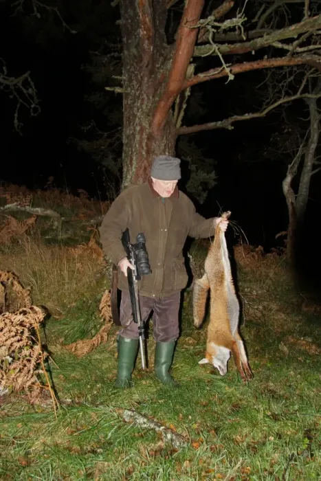 Framed Print : Man holding dead European Red Fox (Vulpes vulpes), shot at night using licenced nite-vision image intensifier scope Framed Print : Man holding dead European Red Fox (Vulpes vulpes), shot at night using licenced nite-vision image intensifier scope