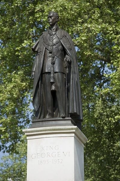 Memorial statue of King George VI in Garter robes, Carlton Gardens, The Mall, City of Westminster, London, England