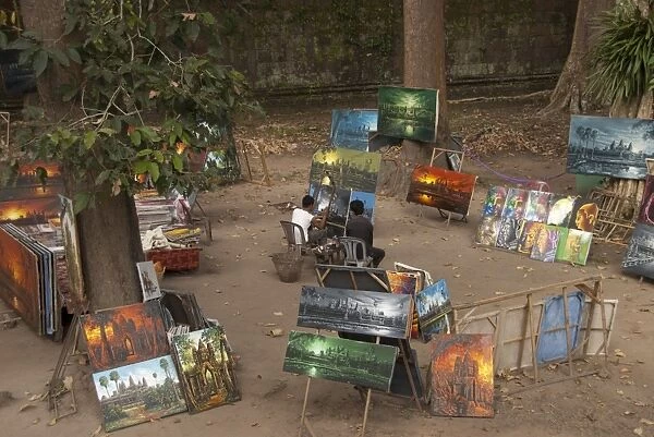 Men selling paintings at Khmer temple, Angkor Thom, Angkor, Siem Riep, Cambodia