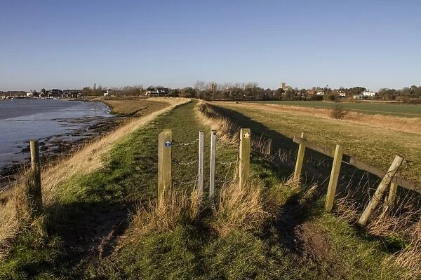 Metal swing gates on sea wall foot path, looking south to Orford, Suffolk