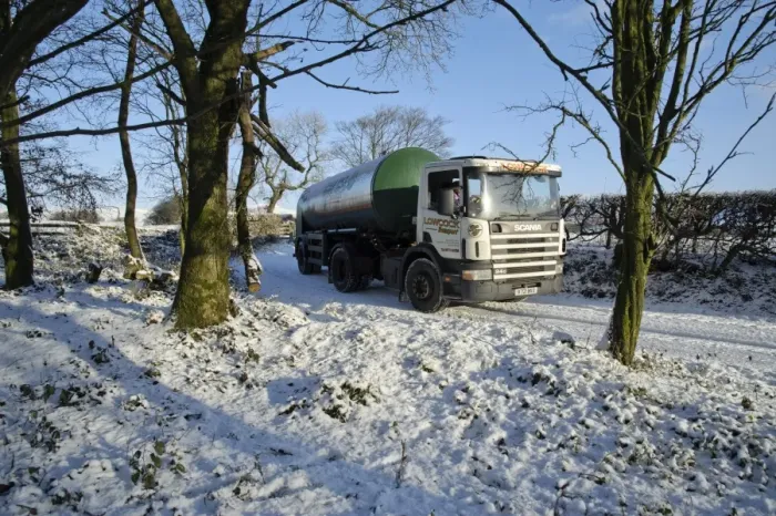 Framed Print : Milk tanker driving down snow covered farm track, Whitewell, Lancashire, England, november Framed Print : Milk tanker driving down snow covered farm track, Whitewell, Lancashire, England, november