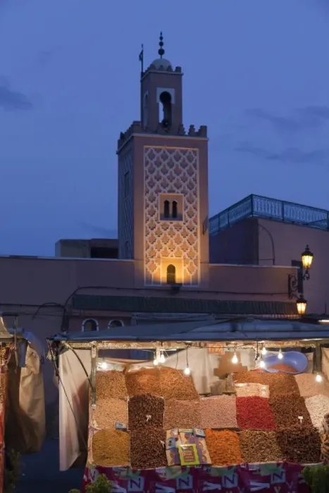 Framed Print : Mosque minaret and market stand in city at dusk, Djemaa el Fna, Marrakesh, Morocco, april