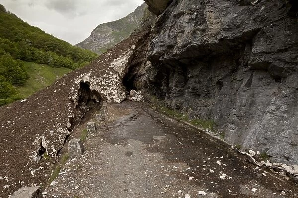 Mountain road blocked by snow and landslip, Val d Ossoue, near Gavarnie, French Pyrenees, Hautes-Pyrenees, France, June