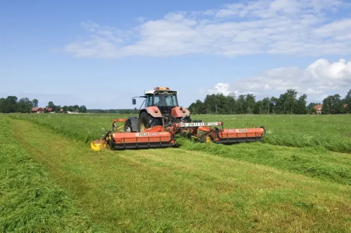 Framed Print : Mowing silage grass with Steyr tractor and Fella mower, Sweden Framed Print : Mowing silage grass with Steyr tractor and Fella mower, Sweden