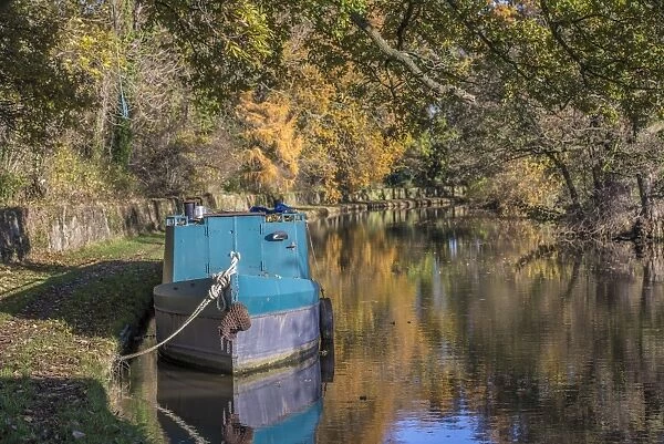 Narrowboat moored on canal, Lancaster Canal, near Cockerham, Lancaster, Lancashire, England, November