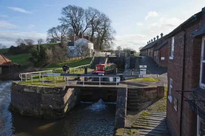 Framed Print : Narrowboat moving through canal staircase lock, Bunbury Locks, Shropshire Union Canal, Bunbury, Cheshire, England Framed Print : Narrowboat moving through canal staircase lock, Bunbury Locks, Shropshire Union Canal, Bunbury, Cheshire, England