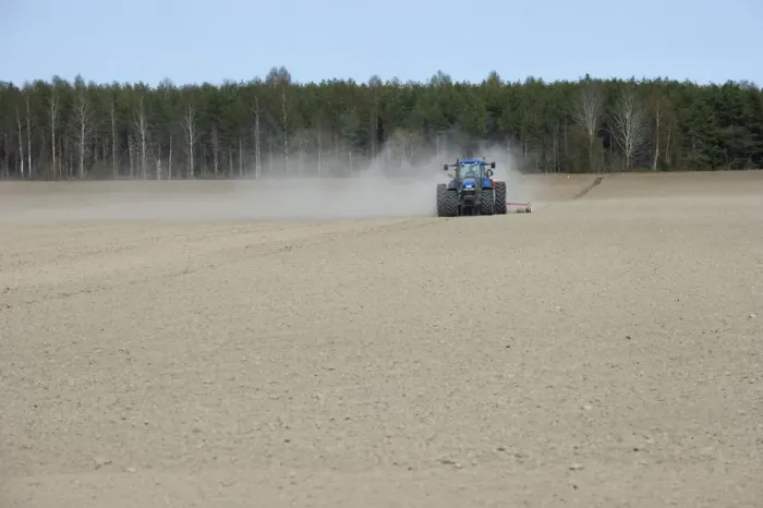 Framed Print : New Holland TM150 tractor, drilling in field with wind blown dust, Sweden, may Framed Print : New Holland TM150 tractor, drilling in field with wind blown dust, Sweden, may
