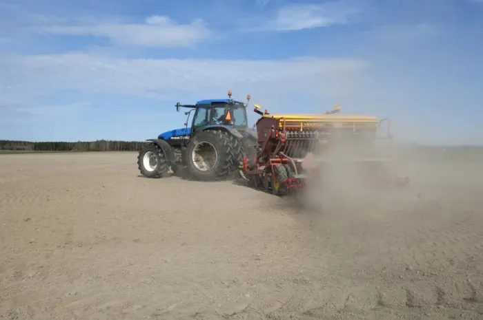 Framed Print : New Holland TM150 tractor with Vaderstad seed drill, with wind blown dust in field, Sweden, may Framed Print : New Holland TM150 tractor with Vaderstad seed drill, with wind blown dust in field, Sweden, may