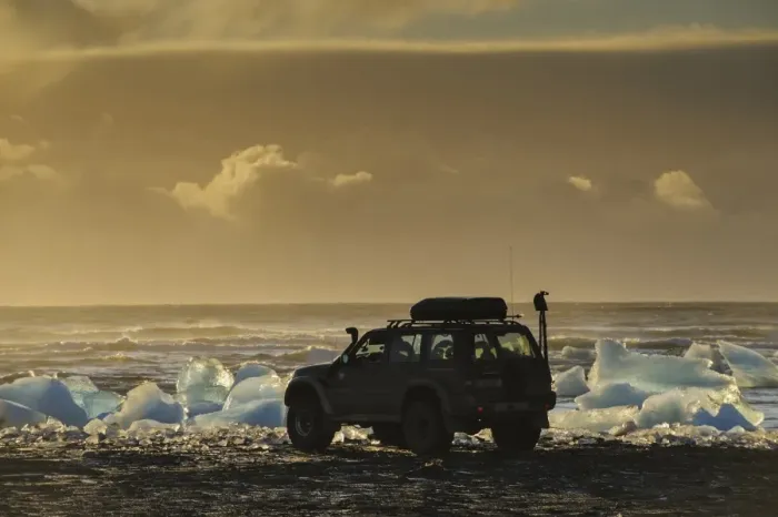 Framed Print : Nissan Patrol 4x4 tour guide vehicle at edge of glacial ice in lake at dusk, Jokulsarlon Lagoon, Vatnajokull Glacier Framed Print : Nissan Patrol 4x4 tour guide vehicle at edge of glacial ice in lake at dusk, Jokulsarlon Lagoon, Vatnajokull Glacier