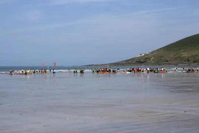 Framed Print : The north end of Saunton Sands beach at low tide with a surfing class Framed Print : The north end of Saunton Sands beach at low tide with a surfing class