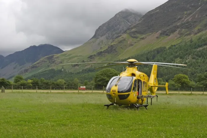 Framed Print : North West Air Ambulance, helicopter in upland valley pasture, Buttermere, Lake District, Cumbria, England, july Framed Print : North West Air Ambulance, helicopter in upland valley pasture, Buttermere, Lake District, Cumbria, England, july