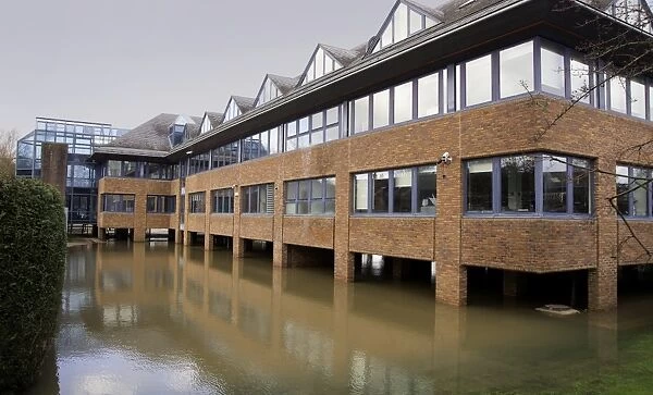 Office block built on floodplain with brick stilts to keep structure above water level during flooding, Forest Row