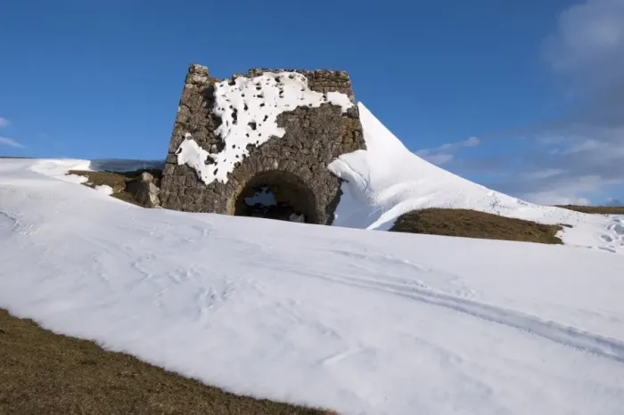 Framed Print : Old lime kiln, used for burning limestone to extract lime to enrich land, surrounded by snowdrifts after snowstorm Framed Print : Old lime kiln, used for burning limestone to extract lime to enrich land, surrounded by snowdrifts after snowstorm