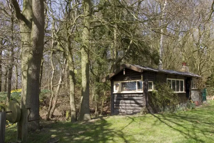 Framed Print : Old log cabin once used by woodsmen who maintained a mainly oak and hazel wood Framed Print : Old log cabin once used by woodsmen who maintained a mainly oak and hazel wood