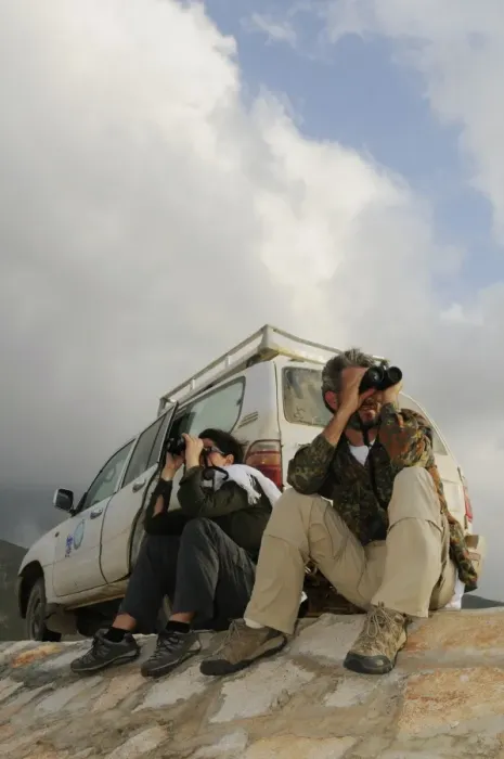 Framed Print : Ornithologists with binoculars, surveying birds along road, Socotra, Yemen, december Framed Print : Ornithologists with binoculars, surveying birds along road, Socotra, Yemen, december