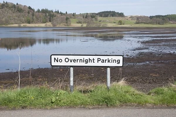 No Overnight Parking sign at edge of loch, Kilmore, Argyll and Bute, Scotland, april