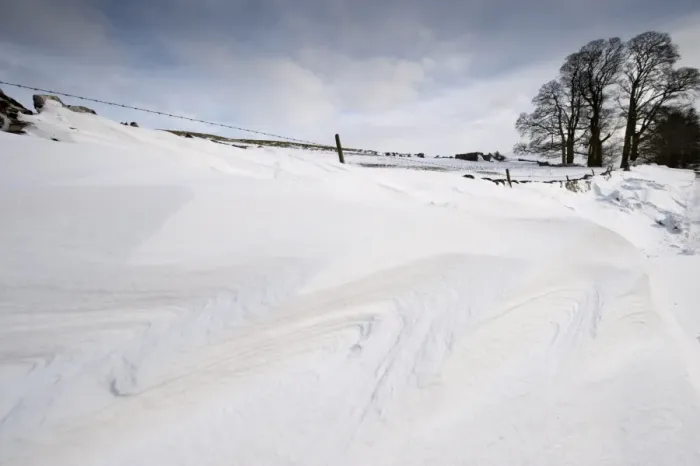 Framed Print : Patterns in snowdrift at back of drystone wall after snowstorm, Cumbria, England, March Framed Print : Patterns in snowdrift at back of drystone wall after snowstorm, Cumbria, England, March