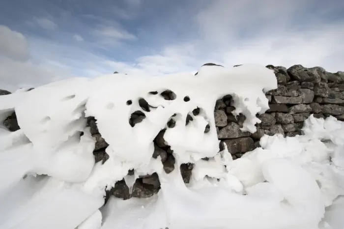 Framed Print : Patterns in snowdrift at back of drystone wall after snowstorm, Cumbria, England, March Framed Print : Patterns in snowdrift at back of drystone wall after snowstorm, Cumbria, England, March