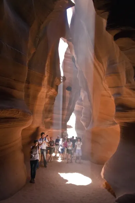 Framed Print : People caught in Light beam in Upper Antelope Canyon was formed by erosion of Navajo Sandstone Framed Print : People caught in Light beam in Upper Antelope Canyon was formed by erosion of Navajo Sandstone