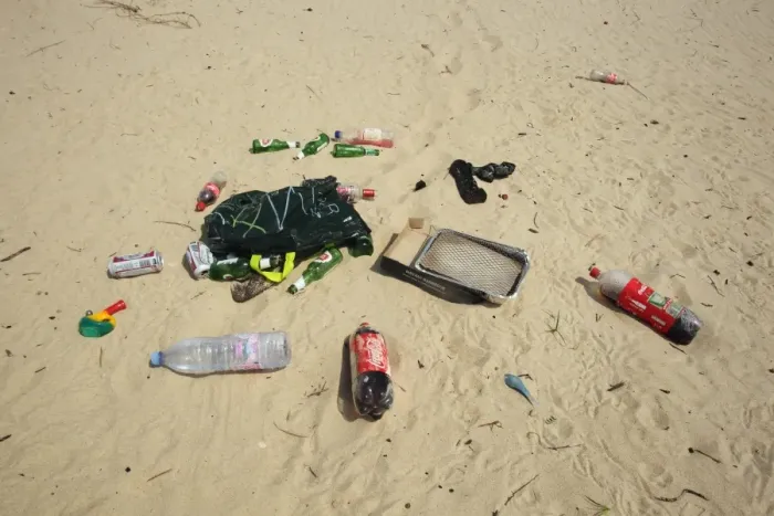 Framed Print : Plastic and glass bottles, plastic bag, disposable barbeque and bong, litter on sandy beach, Studland, Dorset, England Framed Print : Plastic and glass bottles, plastic bag, disposable barbeque and bong, litter on sandy beach, Studland, Dorset, England