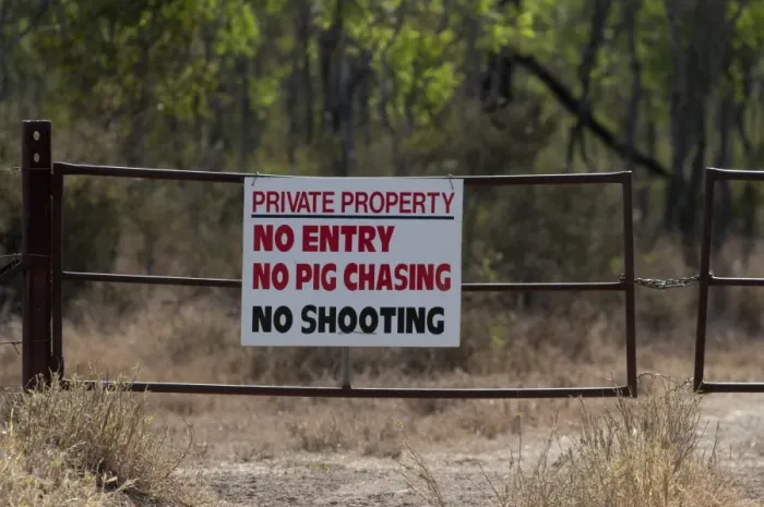 Framed Print : Private Property, No Entry, No Pig Chasing, No Shooting sign on gate, near Charters Towers, Queensland, Australia Framed Print : Private Property, No Entry, No Pig Chasing, No Shooting sign on gate, near Charters Towers, Queensland, Australia