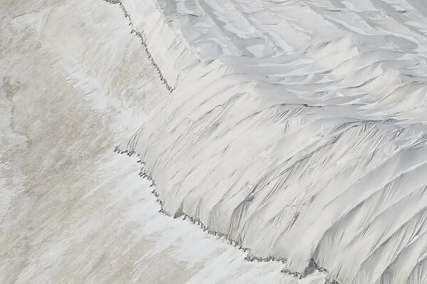 Protective textile covering to delay snow melting on skiing slope, Presena Glacier, Italian Alps, Italy, August