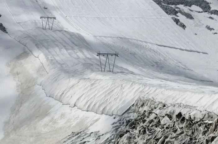 Framed Print : Protective textile covering to delay snow melting on skiing slope with ski lift, Presena Glacier, Italian Alps, Italy Framed Print : Protective textile covering to delay snow melting on skiing slope with ski lift, Presena Glacier, Italian Alps, Italy