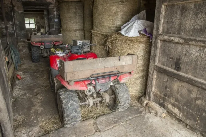 Framed Print : Two Quadbikes in barn on farm, Lancashire, England, August Framed Print : Two Quadbikes in barn on farm, Lancashire, England, August