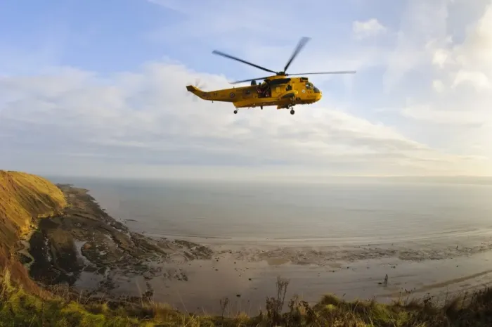 Framed Print : RAF Westland Sea King rescue helicopter with crew members standing in open doorway Framed Print : RAF Westland Sea King rescue helicopter with crew members standing in open doorway